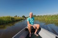 Senior man in motor boat Royalty Free Stock Photo