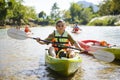 Senior man paddling kayak