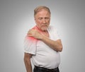 Senior man with pain in his shoulder Royalty Free Stock Photo