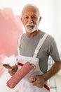 Senior man painting walls Royalty Free Stock Photo