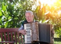 Senior man playing accordion Royalty Free Stock Photo