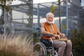 Senior man playing chess outdoors alone. Royalty Free Stock Photo