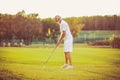 Man playing golf alone Royalty Free Stock Photo