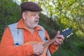 Senior man playing mandolin Royalty Free Stock Photo