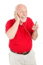Senior Man Playing MP3s Royalty Free Stock Photo