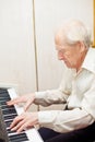 Senior Man Playing Piano Royalty Free Stock Photo