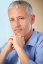 Senior man, portrait and thinking in confidence, wisdom or decision for ambition at home. Face of thoughtful mature male Royalty Free Stock Photo