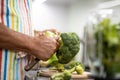 Senior man preparing broccoli