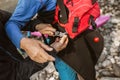 Man preparing for kayak tour on a mountain river