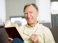 Senior man reading book Royalty Free Stock Photo