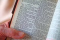 Man reads Luke verses in old Bible 11/24/18 Royalty Free Stock Photo