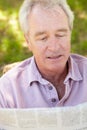 Senior man reading newspaper Royalty Free Stock Photo