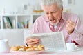 Senior man reading newspaper Royalty Free Stock Photo