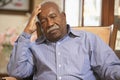 Senior man relaxing in armchair