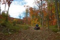 Senior man riding an ATV quad