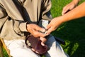 Senior man`s hands holding Euro banknote. Struggling pensioners Royalty Free Stock Photo