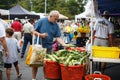 Senior Man Selects Corn Farmer's Market Virginia