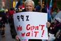 Senior man with 99% sign at Occupy Wall Street