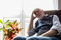 Senior man sleeping in an armchair Royalty Free Stock Photo