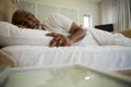 Senior man sleeping on bed in the bedroom Royalty Free Stock Photo