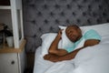 Senior man sleeping on bed at home Royalty Free Stock Photo