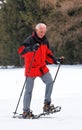 Senior Man Snowshoeing