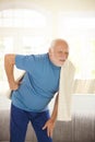 Senior man in sportswear having pain in back Royalty Free Stock Photo