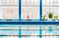 Senior man standing by the indoor swimming pool. Royalty Free Stock Photo