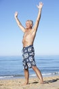 Senior Man Standing On Summer Beach Royalty Free Stock Photo
