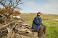 Senior man with stick outdoors