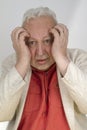 Senior man with strong headache Royalty Free Stock Photo