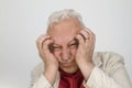 Senior man with strong headache Royalty Free Stock Photo