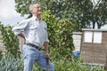 Senior Man Suffering From Back Pain Whilst Gardening Royalty Free Stock Photo