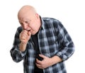 Senior man suffering from cough on white