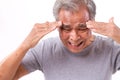 Senior man suffering from headache, stress, migraine Royalty Free Stock Photo