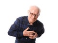 Senior man suffering from heart attack against white background Royalty Free Stock Photo