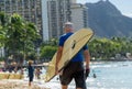 Senior Man with a surfboard Senior Surfer