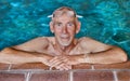 Senior man in swimming pool Royalty Free Stock Photo