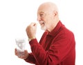 Senior Man - Taking Fish Oil Royalty Free Stock Photo