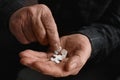 Senior man taking pills, closeup Royalty Free Stock Photo