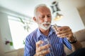 Senior man taking pills Royalty Free Stock Photo