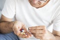 Senior man taking pills Royalty Free Stock Photo