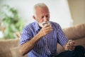 Senior man taking pills Royalty Free Stock Photo