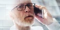 Senior man talking on phone, ray effect, geometric pattern Royalty Free Stock Photo