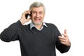 Senior man talking on phone and smile. Royalty Free Stock Photo