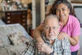 Senior Man with their Caregiver at Home. Concept of Health Care for Elderly Old People, Disabled Royalty Free Stock Photo