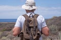 Senior man traveler enjoying beautiful seascape. Adventure and freedom concept Royalty Free Stock Photo