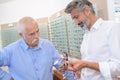 Senior man trying new eyeglasses Royalty Free Stock Photo