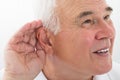 Senior Man Trying To Hear Royalty Free Stock Photo