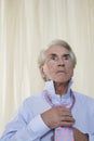 Senior Man Tying Tie Royalty Free Stock Photo